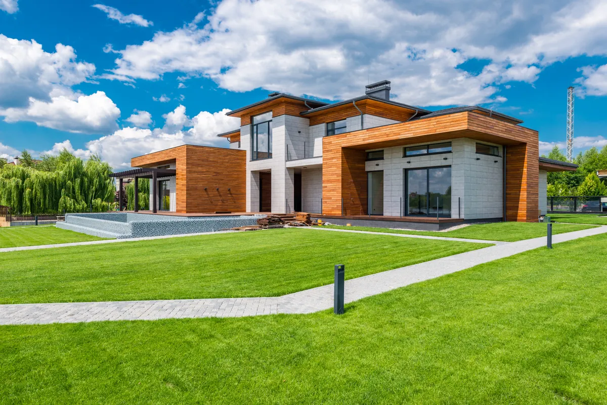 Contemporary house exterior with warm wood details and large windows